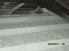 Attic floor foam air leak barrier